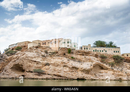 Bild eines Dorfes in Oman im Wadi Shab Stockfoto