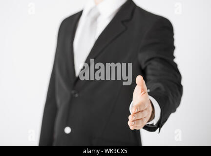Geschäftsmann mit der offenen hand Stockfoto