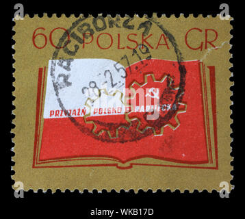 Stempel gedruckt in Polen zeigt offenes Buch und Zahnräder, polnisch-sowjetischen Freundschaft, circa 1956. Stockfoto
