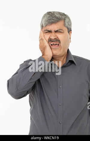 Geschäftsmann Zahnschmerzen leiden Stockfoto