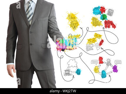 Ständigen Geschäftsmann in Anzug und farbigen business Skizzen Stockfoto