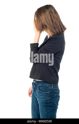Side view of women hiding face in hands Stockfoto