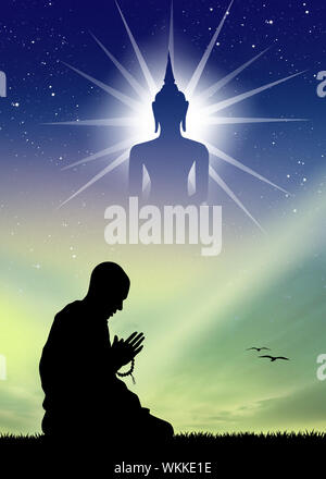 Mann, der zum Buddha betet. Stockfoto