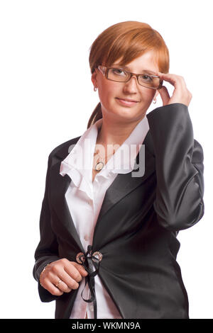 Redhead Business Frau mit schwarzen Suite isoliert auf weißem Stockfoto