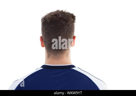 Fußball-Player in blau Jersey auf weißem Hintergrund Stockfoto