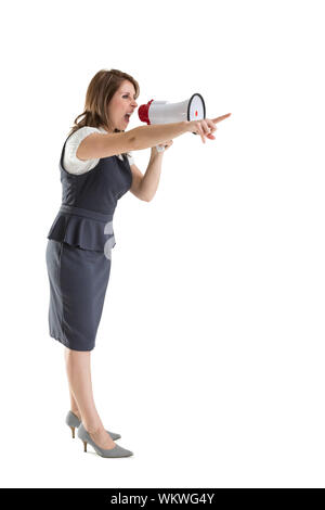 Junge Frau in Megaphon riefen, als Sie über weißen Hintergrund Punkte Stockfoto