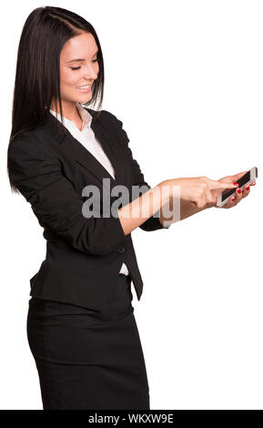 Schöne Geschäftsfrauen in mittels Smart Phone. Auf weissem Hintergrund Stockfoto