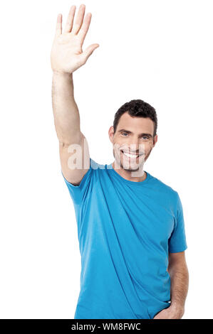 Gut aussehender Mann mittleren Alters winkende Hand über Weiß Stockfoto