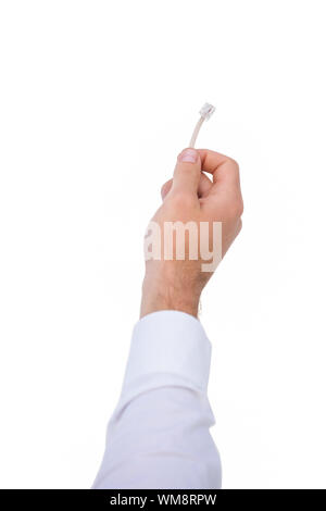 Nahaufnahme von businessmans Hand Kabel auf weißem Hintergrund Stockfoto