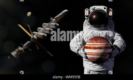 Astronaut holding Planet Jupiter Stockfoto