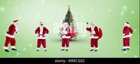 Das zusammengesetzte Bild verschiedener Weihnachtsmänner gegen grüne Vignette Stockfoto