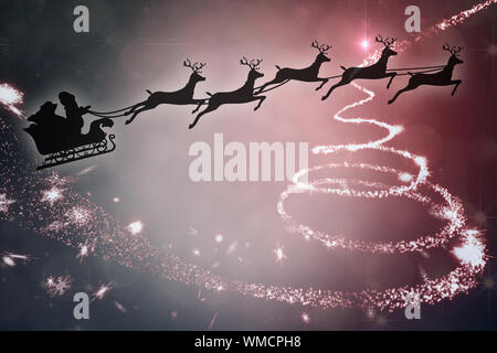 Silhouette der Weihnachtsmann und Rentier gegen Weihnachten Licht Design Stockfoto