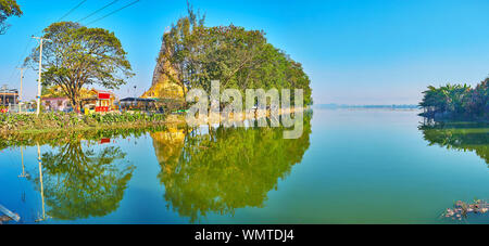 Panorama der diesigen Tharzi Teich ausbreiten, gesäumt von grünen Bäumen, Gärten, Tempeln und Häusern von Nyaungshwe, Myanmar Stockfoto