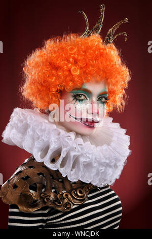 Mädchen in hellen clown Make-up. Stockfoto