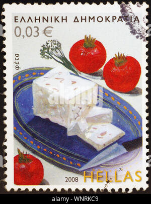 Feta Käse und Tomaten auf griechische Briefmarke Stockfoto