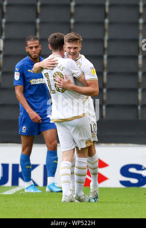 Milton Keynes, UK. 7. Sep 2019. Rhys Healey feiert nach dem Scoring für MK Dons, ihre Leitung es 2 - 0 gegen AFC Wimbledon zu verlängern, während der Himmel Wette Liga 1 Übereinstimmung zwischen MK Dons und AFC Wimbledon bei Stadion MK, Milton Keynes am Samstag, den 7. September 2019. (Credit: John cripps | MI Nachrichten) nur die redaktionelle Nutzung, eine Lizenz für die gewerbliche Nutzung erforderlich. Foto darf nur für Zeitung und/oder Zeitschrift redaktionelle Zwecke Credit: MI Nachrichten & Sport/Alamy Live-Nachrichten verwendet werden. Stockfoto