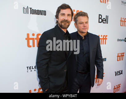 Toronto, Kanada. 9 Sep, 2019. Schauspieler Matt Damon (R) und Christian Bale posieren für Fotos, bevor die internationale Premiere des Films 'Ford v Ferrari' an Roy Thomson Hall während der 2019 Toronto International Film Festival (TIFF) in Toronto, Kanada, an Sept. 9, 2019. Credit: Zou Zheng/Xinhua Stockfoto