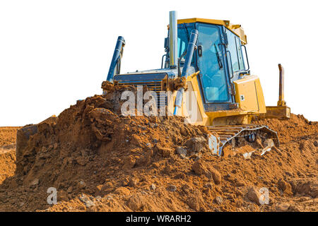 Gebrauchte Planierraupe - Bagger mit Beschneidungspfaden auf weißem Hintergrund. die Arbeiten auf der Baustelle oder Sandkasten. Stockfoto