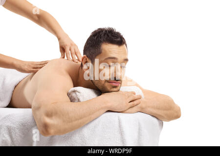 Jungen gutaussehenden Mann massiert isoliert auf weißem Hintergrund Stockfoto