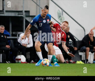 BUDAPEST, Ungarn - 9. SEPTEMBER: (r-l) Laszlo Kleinheisler Ungarns Herausforderungen Marek Hamsik der Slowakei während der UEFA Euro 2020 Gruppe E-qualifikationsspiel zwischen Ungarn und der Slowakei an Groupama Arena am 9. September 2019 in Budapest, Ungarn. Stockfoto