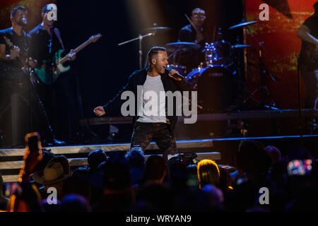 Calgary, Kanada. 08 Sep, 2019. Co-host, Dallas Smith führt während der 2019 Canadian Country Music Association Awards zeigen. Credit: SOPA Images Limited/Alamy leben Nachrichten Stockfoto