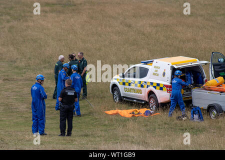East Sussex, Beachy Head, Großbritannien, 10. Juli 2019: Die HM Coastguard Rettungsteam und Sussex Polizei an einen Vorfall auf der Klippe, einer der am meisten Stockfoto