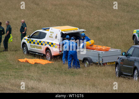 East Sussex, Beachy Head, Großbritannien, 10. Juli 2019: Die HM Coastguard Rettungsteam und Sussex Polizei an einen Vorfall auf der Klippe, einer der am meisten Stockfoto
