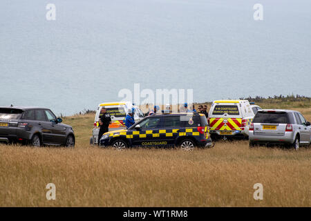 East Sussex, Beachy Head, Großbritannien, 10. Juli 2019: Die HM Coastguard Rettungsteam und Sussex Polizei an einen Vorfall auf der Klippe, einer der am meisten Stockfoto