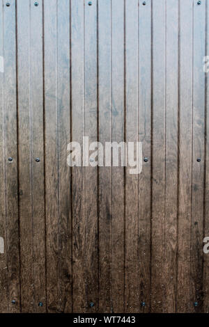 Braun Holz Wand oder Zaun Hintergrund. Hintergrund mit senkrechten Brettern. Copyspace für Text Stockfoto