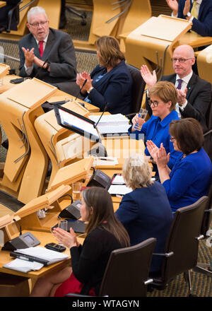 Edinburgh, Großbritannien. 5. September 2019. Im Bild: (oben-unten) Michael Russell MSP; Fiona Hyslop MSP; John Swinney MSP - stellvertretender Erster Minister; Nicola Sturgeon MSP - Erster Minister; Jeane Freeman MSP; Roseanne Vunningham MSP; Aileen Campbell MSP. Nicola Sturgeon beantwortet Fragen während der ersten Sitzung des Ersten Minister Fragen nach der Sommerpause. Fragen rund um BREXIT, Unabhängigkeit, Finanzen, und sektiererischen Unordnung. Colin Fisher/CDFIMAGES.COM Stockfoto