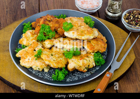 Die koteletts von Hackfleisch/Faschiertem in den Teig. Foto Stockfoto