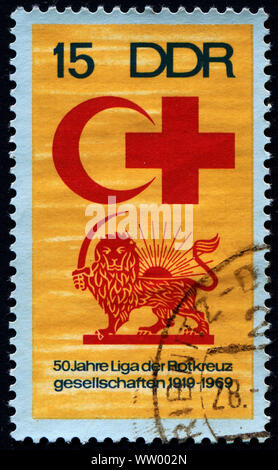 Deutschland, ca. 1969: Briefmarke in Deutschland (DDR), gedruckt auf dem Internationalen Roten Kreuz und Halbmond, ca. 1969 gewidmet Stockfoto