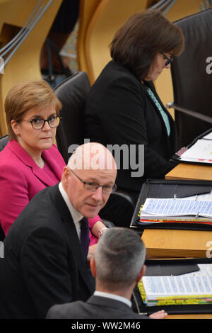 Edinburgh, Großbritannien. 12 Sep, 2019. Im Bild: (oben-unten) Jeane Freeman MSP-Health Minister; Nicola Sturgeon MSP - Erster Minister von Schottland und Leiter der Scottish National Party (SNP); John Swinney MSP - Delegieren erster Minister; Derek Mackay MSP-Finanzminister. Erste Sitzung des Ersten Minister Fragen als das schottische Parlament versucht, einen Weg durch den Fallout der neuesten Brexit Verwirrung zu lenken und Schottland von aus der EU zu verhindern. Credit: Colin Fisher/Alamy leben Nachrichten Stockfoto