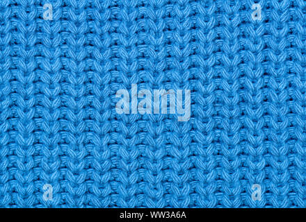 Die Textur der Gestrick in Blau. Close-up. Zusammenfassung Hintergrund. Stockfoto