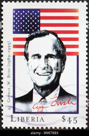Präsident George W. Bush und der Flagge auf Briefmarke Stockfoto
