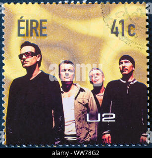 Die U2 auf irischen Briefmarke Stockfoto