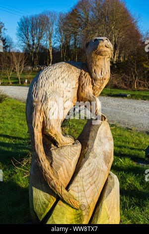 Holzschnitzerei von ein Otter am Tobermory camp site, Isle of Mull, Schottland, Großbritannien Stockfoto