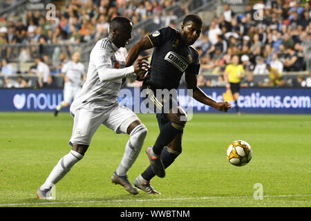 Chester, Pennsylvania, USA. 14 Sep, 2019. LAFC player, ADAMA DIOMANDE (99), die in Aktion gegen die von der Union MARK MCKENZIE (4) während der Gleichen bei Talen Energie Stadion in Chester, Pennsylvania Credit: Ricky Fitchett/ZUMA Draht/Alamy leben Nachrichten Stockfoto