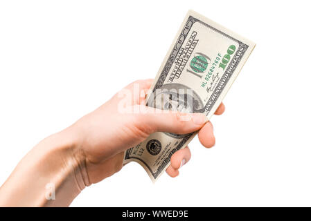 Dollar in der Frau die Hand auf weißem Hintergrund. Stockfoto