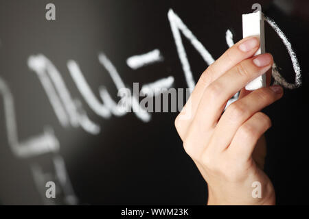 Lehrer zeichnen Zustand des Synchronismus phase Stockfoto