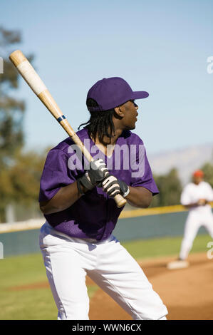 Baseball-Spieler bei Bat Stockfoto
