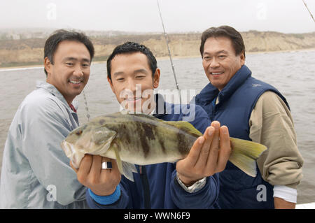 Sportfisch Fischer anzeigen Stockfoto