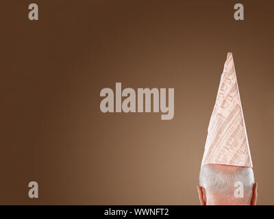 Unternehmer tragen Dunce Cap Stockfoto