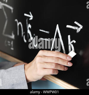 Lehrer zeichnen Zustand des Synchronismus phase Stockfoto