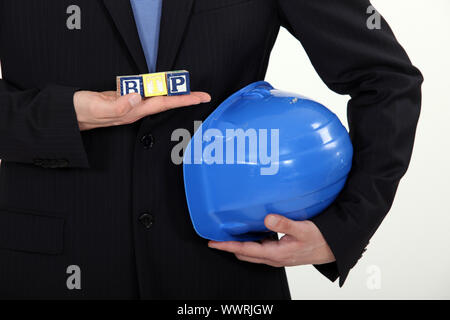 Architektin halten Kinder Bausteine Stockfoto