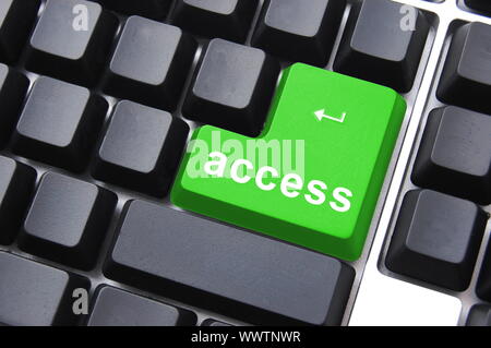 Grüne Taste Zugriff auf die Tastatur eines Computers Stockfoto