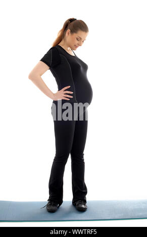 Bild von schöne schwangere Frau in schwarz arbeiten Stockfoto