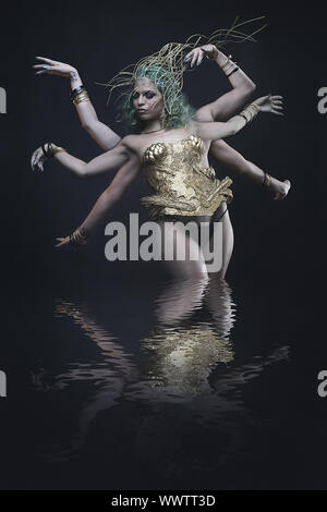 Mode, Gottheit, schöne Frau mit grünen Haaren in der goldenen Göttin Rüstung. Fantasy Warrior Stockfoto