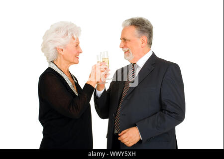 elegante älteres Ehepaar Toasten Stockfoto
