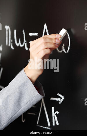 Lehrer zeichnen Zustand des Synchronismus phase Stockfoto